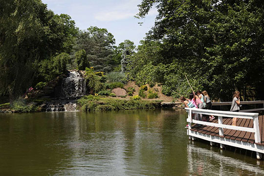 Students Fishing Off the Dock at the West Hills Campus pond