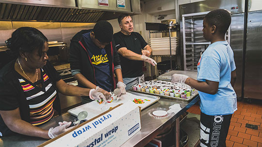 Students and Teacher Doing Vocational Cooking Instruction on the West Hills Campus