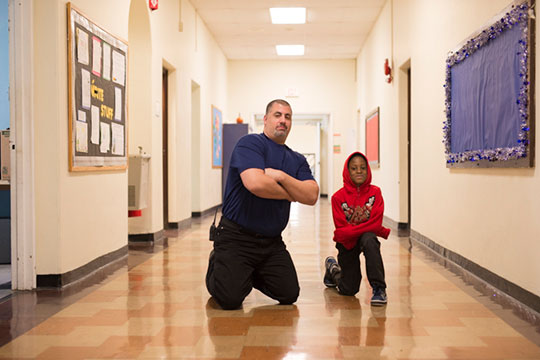 Gersh Academy Student and Intervention Specialist Posing Together in the Hallway
